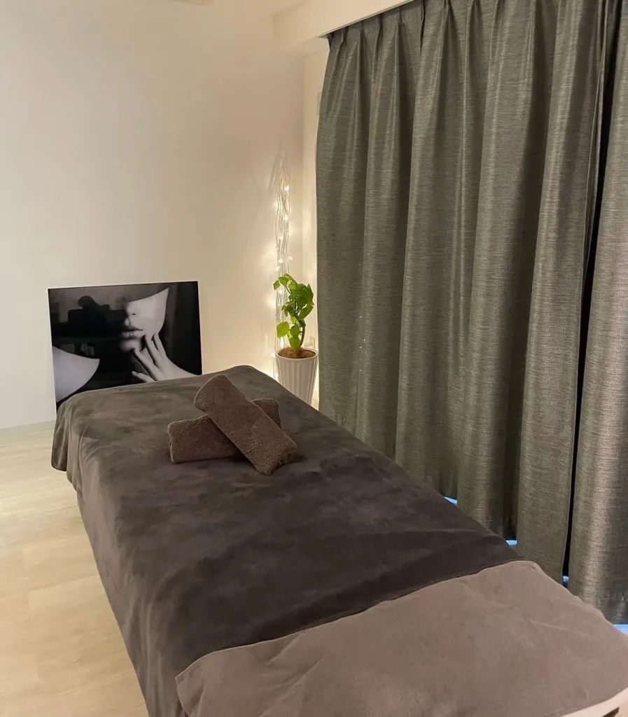 Treatment bed inside a private beauty salon in Osaka